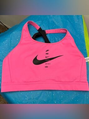 Hot pink Nike sports bra top with crossed straps. Blackpink size L